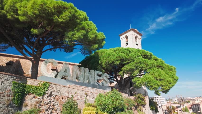 Sign of the city of Cannes, symbol of the famous resort town on French Riviera, Cote d Azur, France. Cannes sign outside of the Church of Our Lady of Esperance on top of a hill overlooking the city