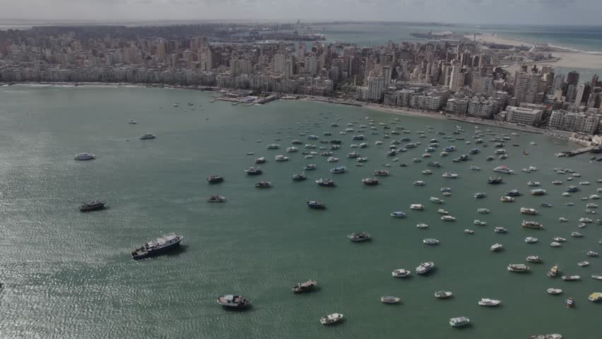 Aerial drone footage of the Mediterranean Corniche in Alexandria, Egypt.