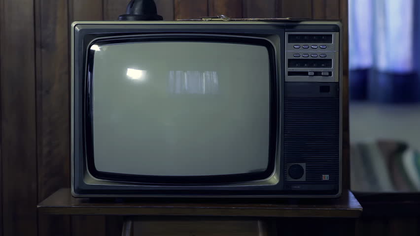 Old Television Turning On With Green Static Screen in a Dimly Lit Living Room, Zoom In - 4K