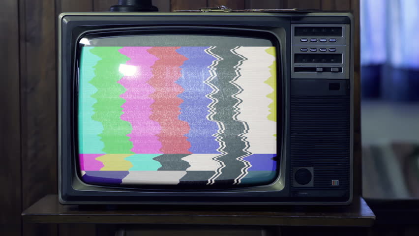 Old Television Turning On With Green Static Screen in a Dimly Lit Living Room, Zoom In - 4K