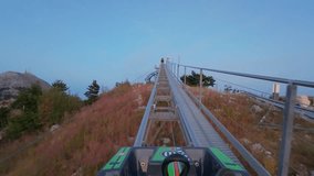 First Person View of Ascending the Alpine Coaster Rails on Lovcen Mountain, Montenegro - Powered by Shutterstock - Get 15% off with code: PIKWIZARD15