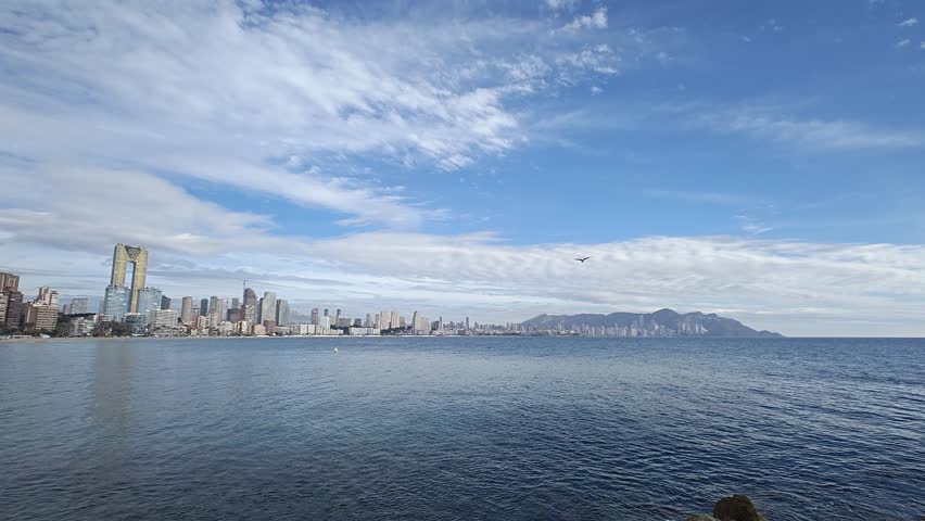 Beautiful view to Mediterranean Sea and Benidorm resort city, Levante beach. Benidorm is a popular coastal resort town in Alicante province, Spain