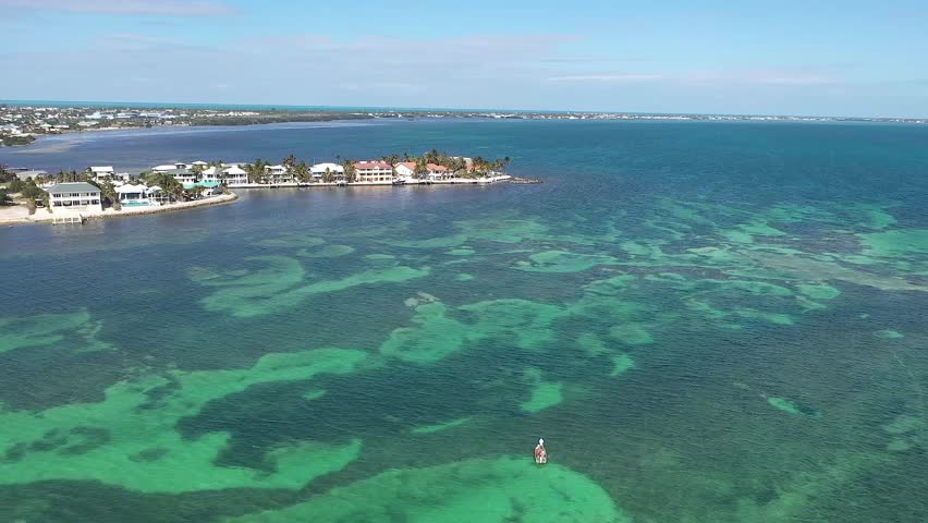 Boating over coral, Sombrero Beach Marathon Florida Keys, aerial footage
