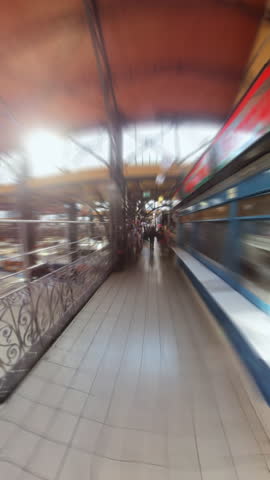 Time lapse from people walking inside Great Market Hall of Budapest