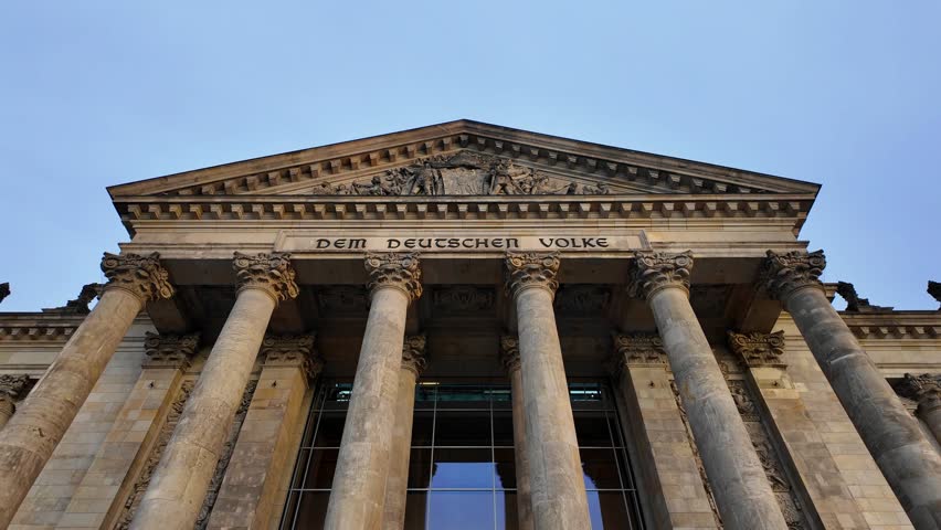 Dem Deutschen Volke sign on Reichstag building in Berlin, Germany	
