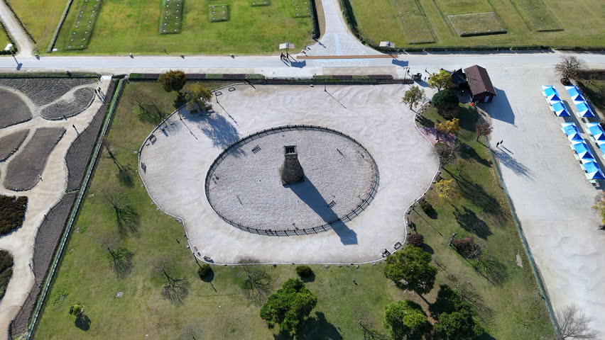 Aerial View of Ancient Korean Stone Tower in Circular Garden Park Landmark