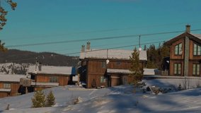 Funicular cabins moving against the backdrop of hotel houses and a tourist village, ski slope, skiers descending from the mountain
 - Powered by Shutterstock - Get 15% off with code: PIKWIZARD15