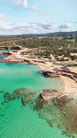 Cala Comte beach, in Ibiza. Incredible waters surrounded by nature.