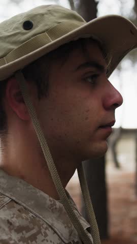 Soldier Stands At Attention Saluting The General In The Woods With Trees