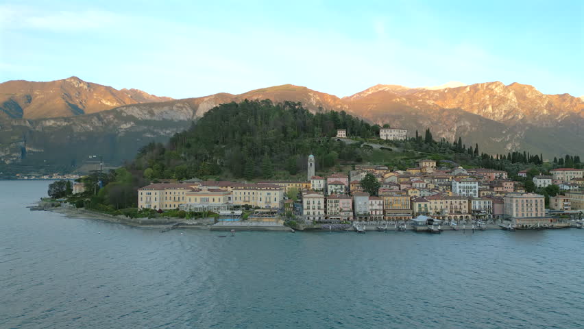 Stunning drone landscape shot of Lake Como, Italy, with its charming villages, impressive architecture, and mountain vistas that captivate every visitor exploring this beautiful European region