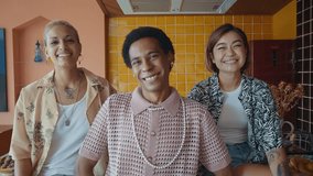 Group of friends bonding at home, LGBTQ and diversity concepts - Homosexual couple and fluid gender non binary young man with cross dressing clothing style having fun in the apartment, LGBT people - Powered by Shutterstock - Get 15% off with code: PIKWIZARD15