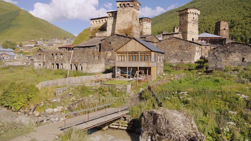 Ancient stone towers rise above landscape, leaving traces of bygone era, past with present in charming village of Ushguli in Svanentia in Georgia.