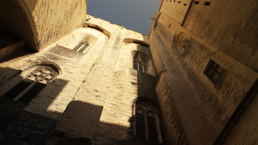 Windows in the walls of the Palais des Papes in Avignon, France