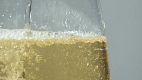 Wine white vinegar is poured, slow motion macro, lots of bubbles in liquid - Powered by Shutterstock - Get 15% off with code: PIKWIZARD15