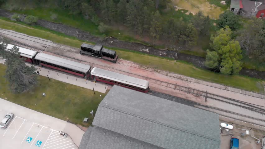 Hill City, South Dakota. Aerial view of city train station. Slow motion