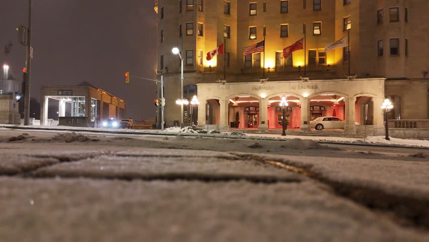 Chateau Laurier, Ottawa Union Station and parliment building  at night drone aerial