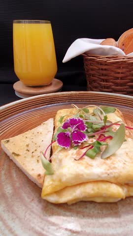 Omelette and toast and orange juice 
