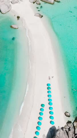 Clear ocean waves crashing on white sandy beach. Nangyuan Island Beach, Koh Tao, Thailand.
