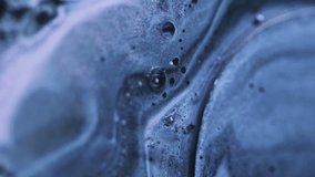 Glitter oil splash. Bubble paint spill. Blur neon blue black color wet shimmer gel emulsion ink flow motion abstract art background. - Powered by Shutterstock - Get 15% off with code: PIKWIZARD15