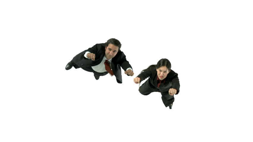 Flying businessman and businesswoman in front of a white background.