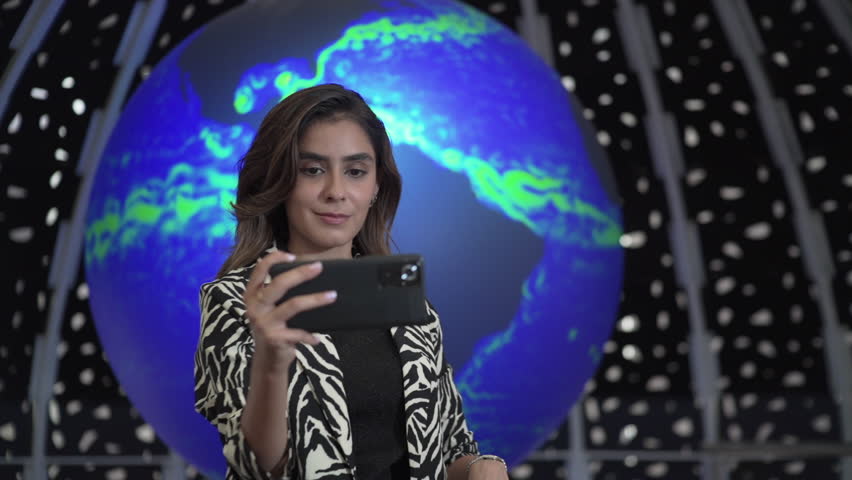 young woman takes a selfie in front of a museum exhibit, happines, art.