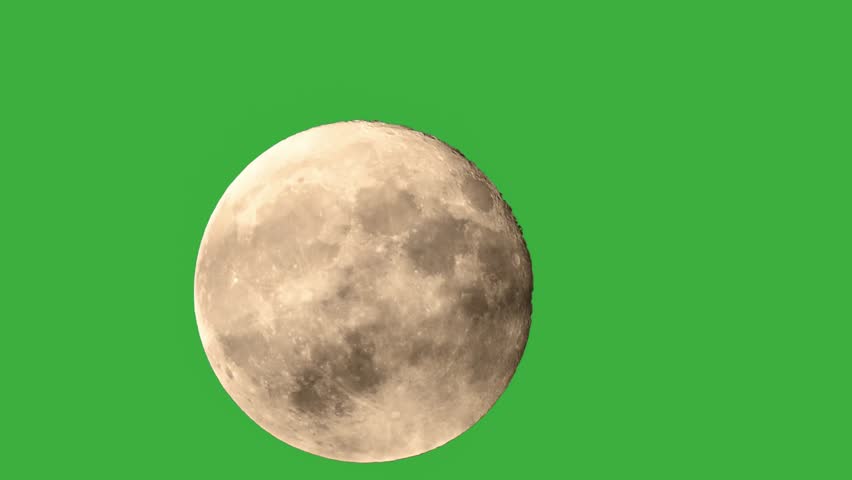 Majestic full moon rises through the clouds in a captivating time lapse during the dark night sky