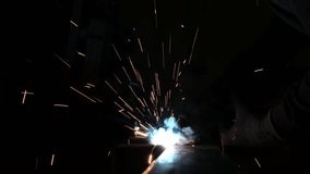 Sparks fly when a welder welds steel together - Powered by Shutterstock - Get 15% off with code: PIKWIZARD15