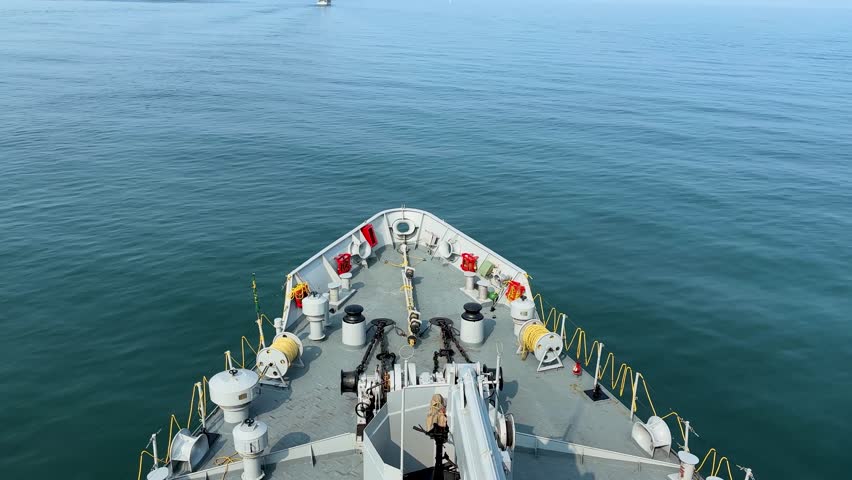 Top-down view of an Indian Navy warship, showcasing advanced technology and robust construction. Ready for projects exploring naval engineering, military might, and maritime technology. 4K UHD