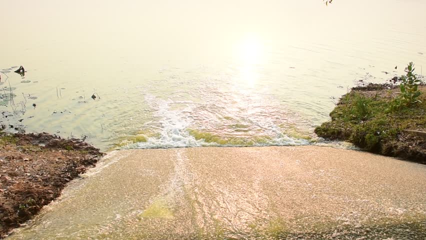 water flowing into the river