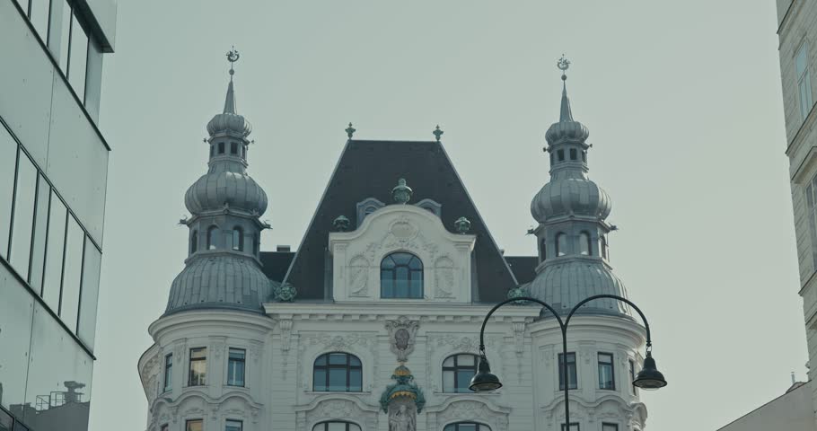 Elegant historic building with intricate towers and classic architecture in Vienna Austria