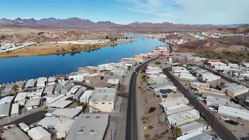 Drone Flying over Water Front Houses next to the Colorado River. Parker Arizona