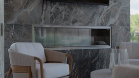 Modern interior setting featuring marble wall with built in fireplace. In front of fireplace there is white cushioned chair with wooden armrests. Living room or lounge area - Powered by Shutterstock - Get 15% off with code: PIKWIZARD15