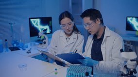 Scientist looking for checking chemical at a test tube in laboratory for research on pharmacy medical for healing and antibody for protect disease and virus - Powered by Shutterstock - Get 15% off with code: PIKWIZARD15