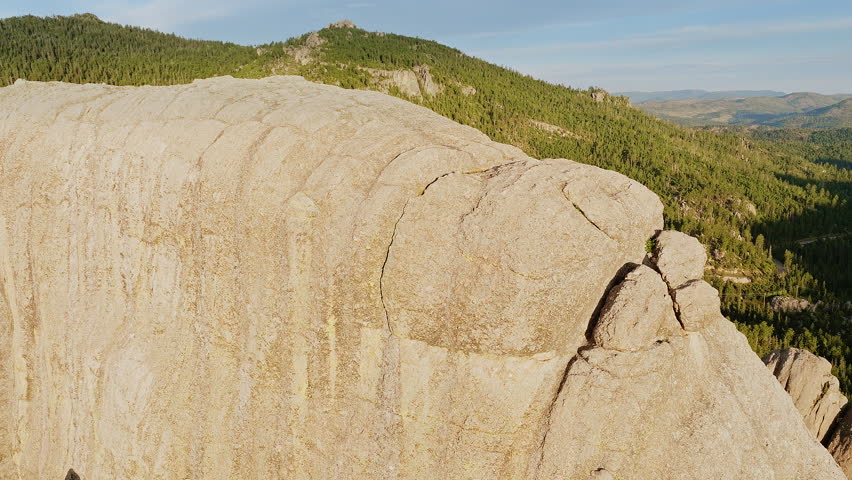 Sweeping aerial view of dramatic geological formations in the western United States.