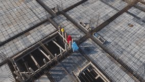 Aerial Video Workers Performing Metalwork and Wall Tasks on a High-Rise Construction Project - Powered by Shutterstock - Get 15% off with code: PIKWIZARD15