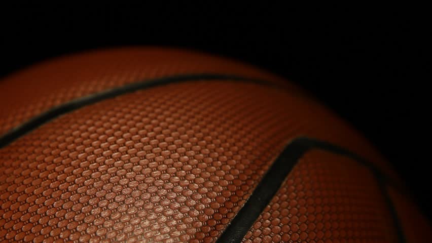 footage of basketball dark background