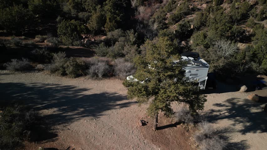 Aerial reveal past camper to Dixie national forest in St George Utah