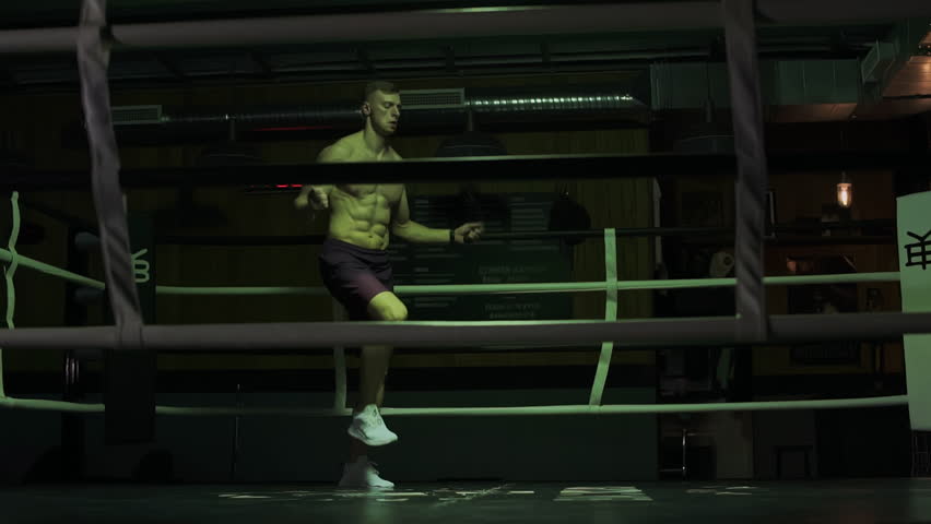 The boxer Jumping Rope on Boxing Ring