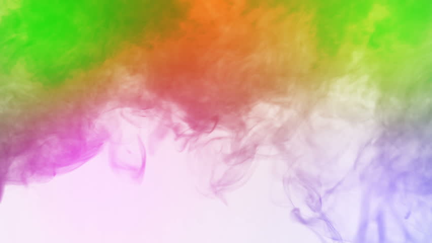 White background. Colored smoke. Slow motion