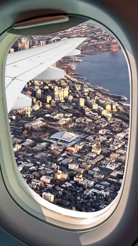 Panoramic aerial view of the city of Seattle, Washington in the United States of America. city ​​of Seattle seen from above through the window of an airplane flying over the area