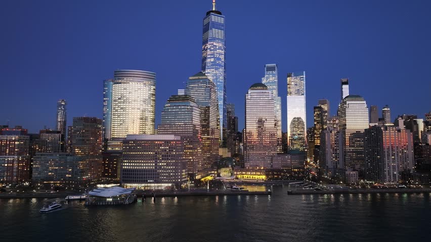 Sunset Skyline In New York Skyline At Manhattan In New York United States. Sunset Landscape. Financial District. New York Skyline At New York United States. Highrise Buildings Scenery.