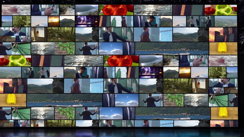Big multimedia video wall displaying a variety of footages including nature, business, food and industry