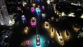 Vijit Chao Phraya celebration: Illuminated boats fill river in Bangkok night - Powered by Shutterstock - Get 15% off with code: PIKWIZARD15