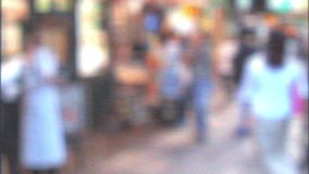 A blurred VHS video captures a crowded urban scene in South Korea, with pedestrians walking along the sidewalks and a hazy background featuring buildings, shops, vehicles, and other structures - Powered by Shutterstock - Get 15% off with code: PIKWIZARD15