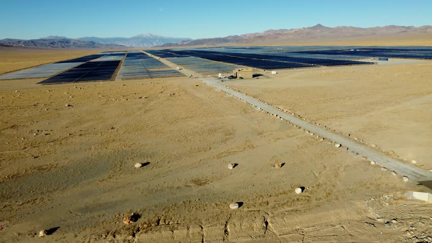 US, NV, Luning, Hwy 316, 2025-01-17 - Drone view of a solar power field in an empty desert