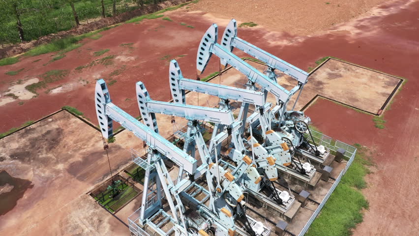   Working oil pump jack on a oil field Oil and gas industry