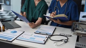 Medical students working on laptop computer and tablet and medical stethoscope on clipboard on desk. - Powered by Shutterstock - Get 15% off with code: PIKWIZARD15