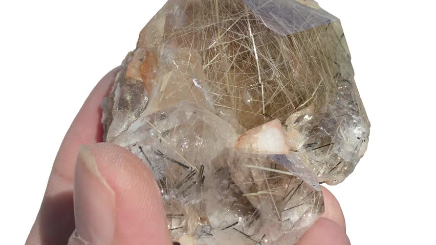 Golden Rutile Inclusion, Cervantite And Stibnite in Quartz Close-Up.