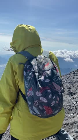  Woman Hiker Going Down On Mount Slope carefully at Rinjani Mountain Trail