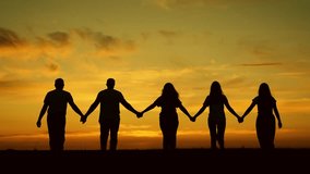 Group of business people walk together hand in hand in nature. Community of people teamwork sunrise sky. Group of business person outdoor. Unity of group of people united by team idea. Human resources - Powered by Shutterstock - Get 15% off with code: PIKWIZARD15